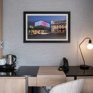 Thumbnail of http://A%20well-furnished%20hotel%20room%20with%20a%20desk,%20chair,%20and%20television,%20ideal%20for%20work%20and%20relaxation.