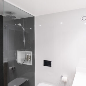 Thumbnail of http://A%20sleek%20modern%20bathroom%20featuring%20a%20glass%20shower%20stall%20and%20contemporary%20fixtures.