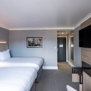 Thumbnail of http://A%20hotel%20room%20featuring%20two%20beds%20and%20a%20television,%20designed%20for%20comfort%20and%20relaxation.